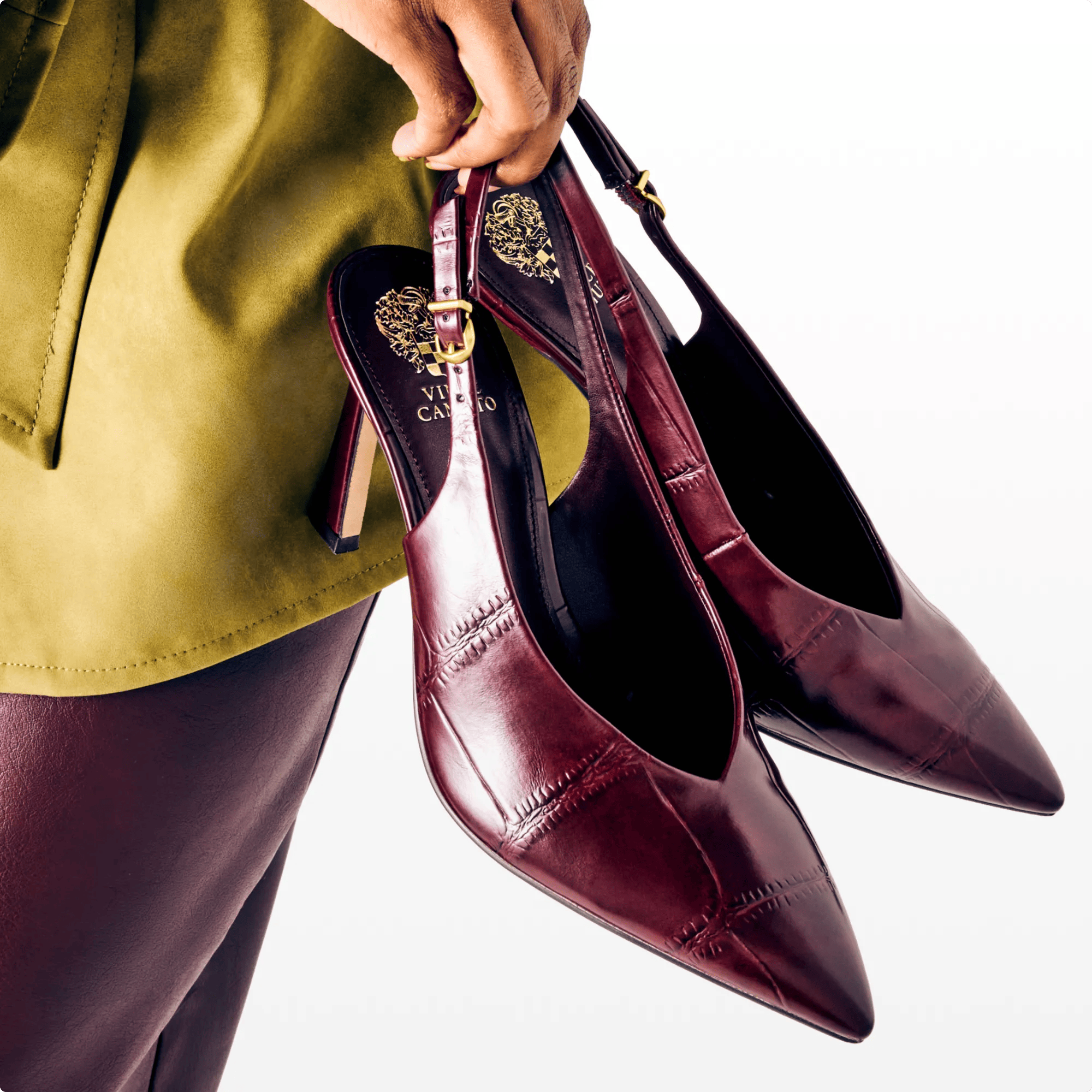 Featuring a pair of burgundy heels.