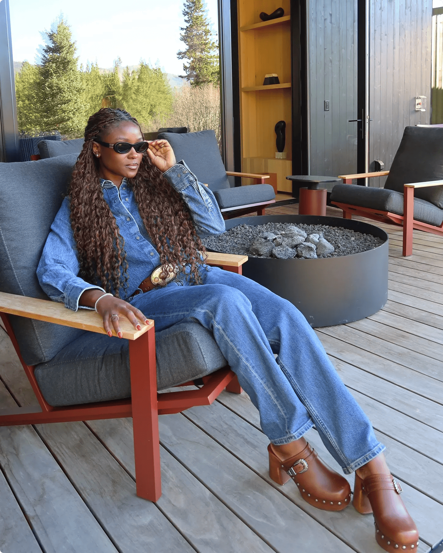 Featuring Barbarah William wearing brown studded clogs.
