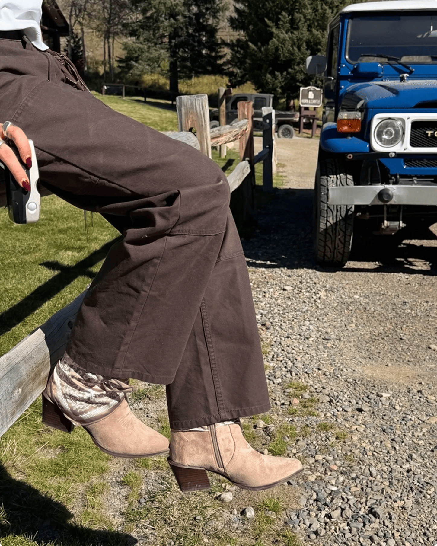 Featuring Brianna LaPaglia wearing a cowboy ankle boots.