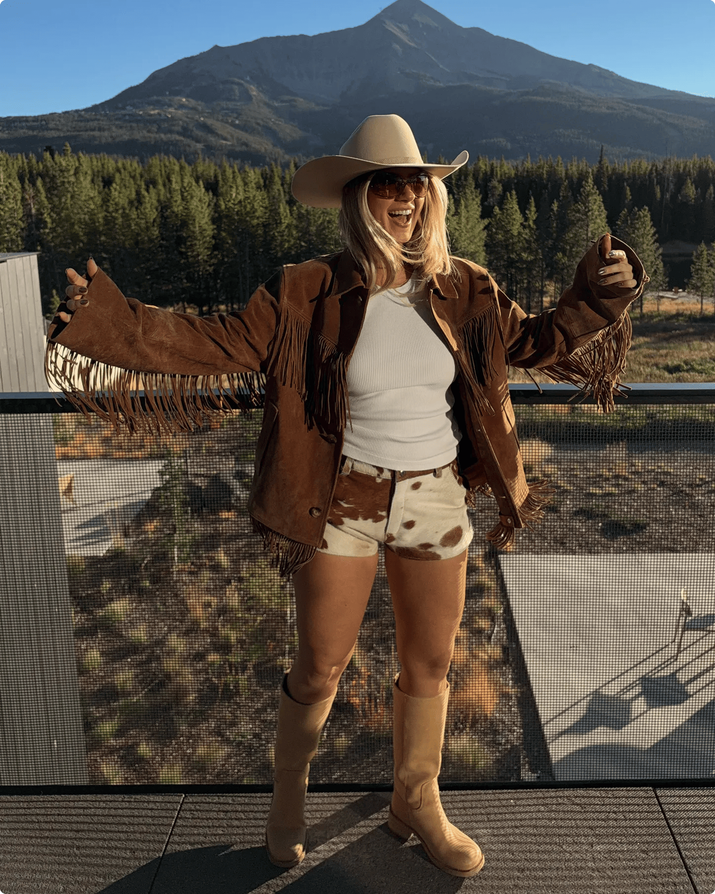 Featuring Danielle Carolan in a pair of tall boots from Frye & Co.