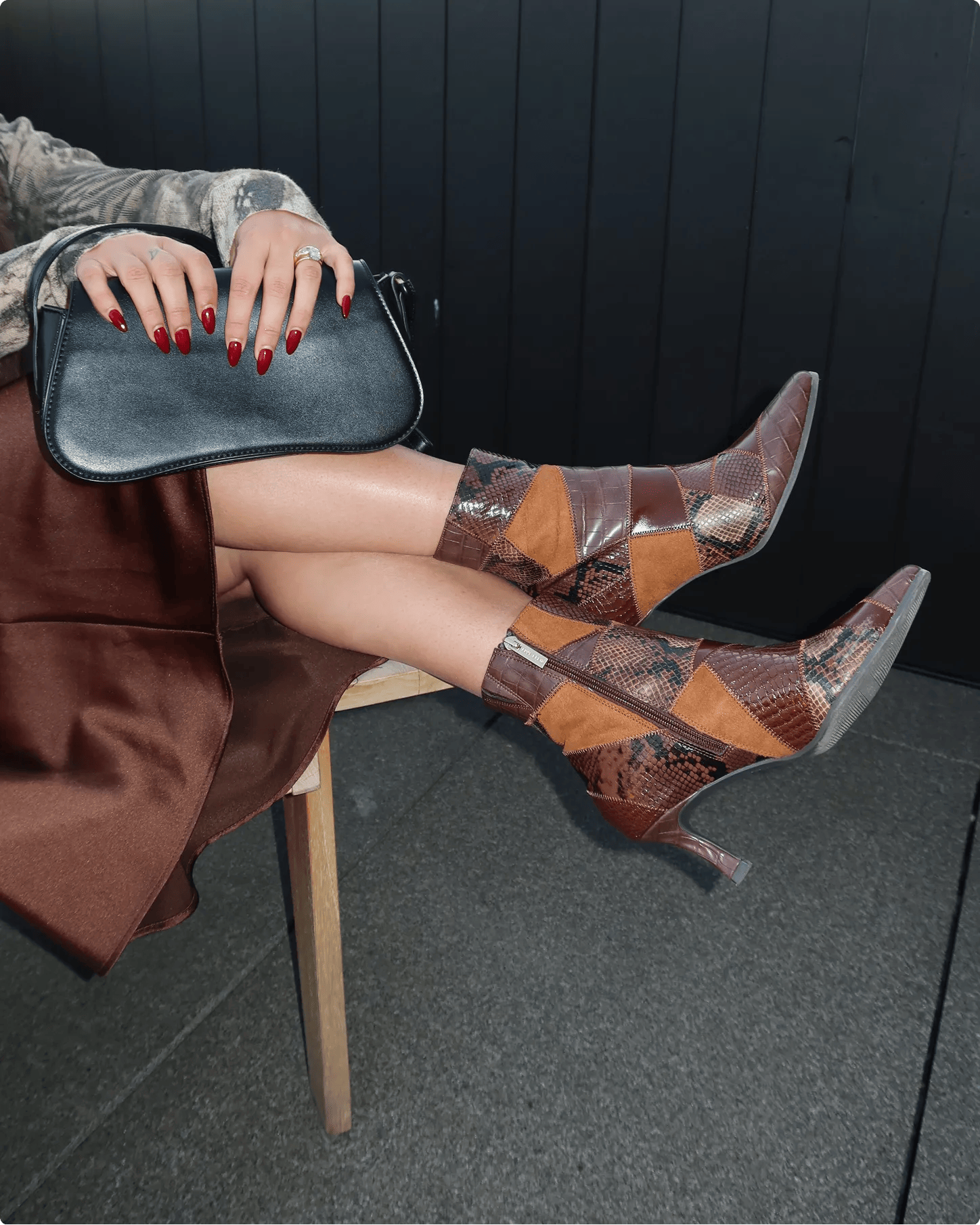 Featuring Maria Ciuffo wearing boots.