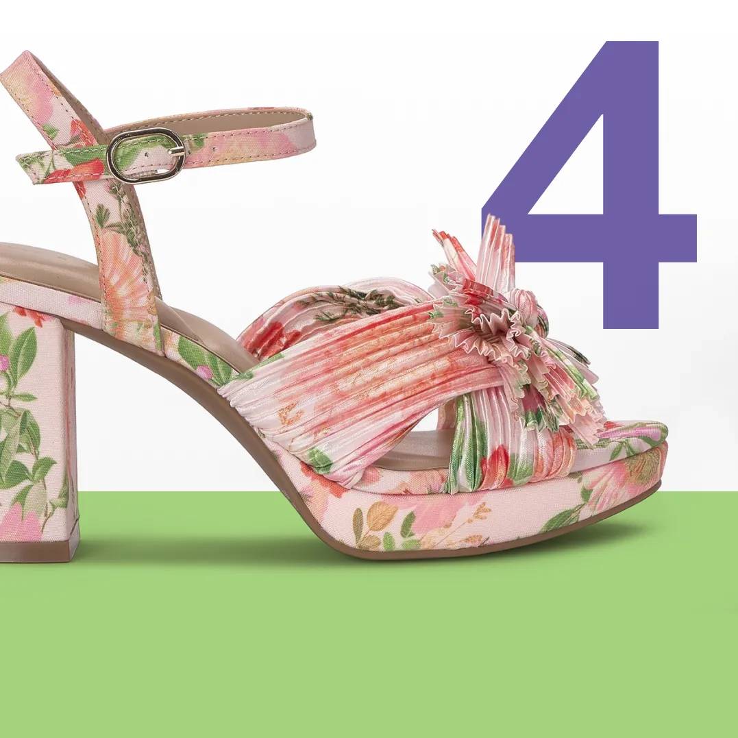 Featuring a floral printed dress heel.