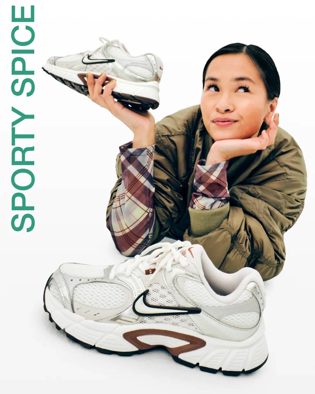 Featuring a woman holding Nike sneakers.