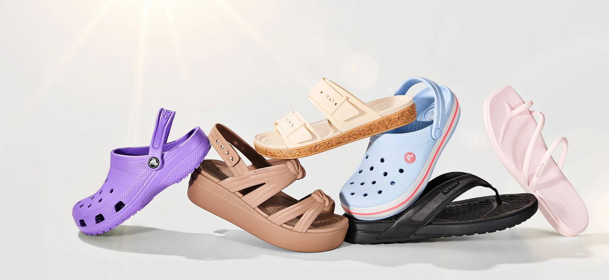 Assortment of Crocs styles.