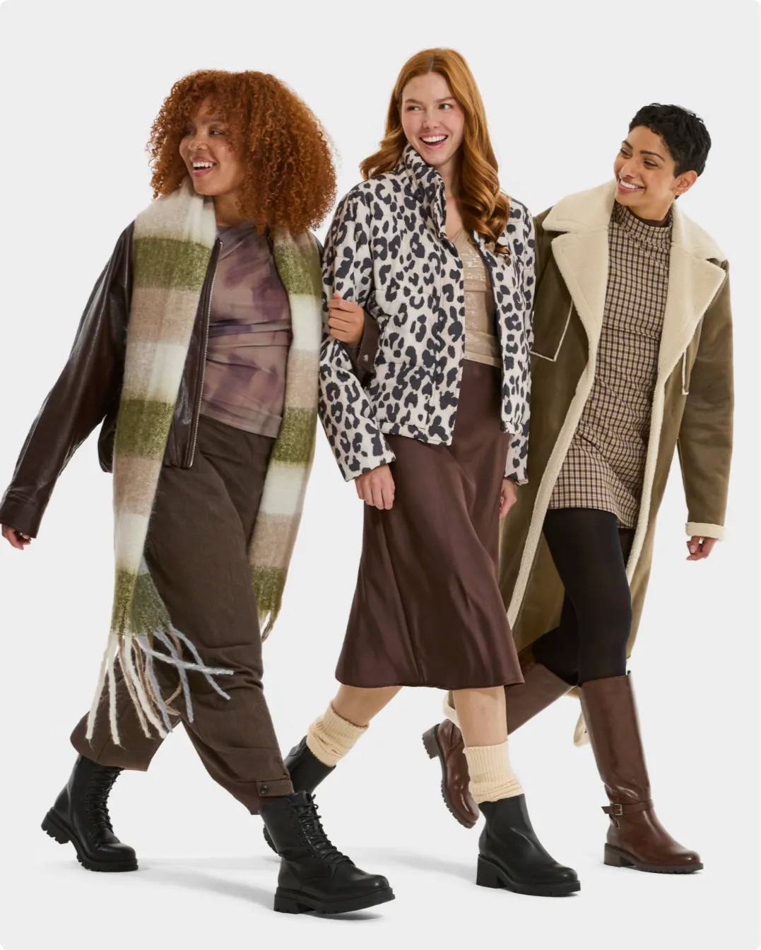 Women wearing fashion boots and winter clothing