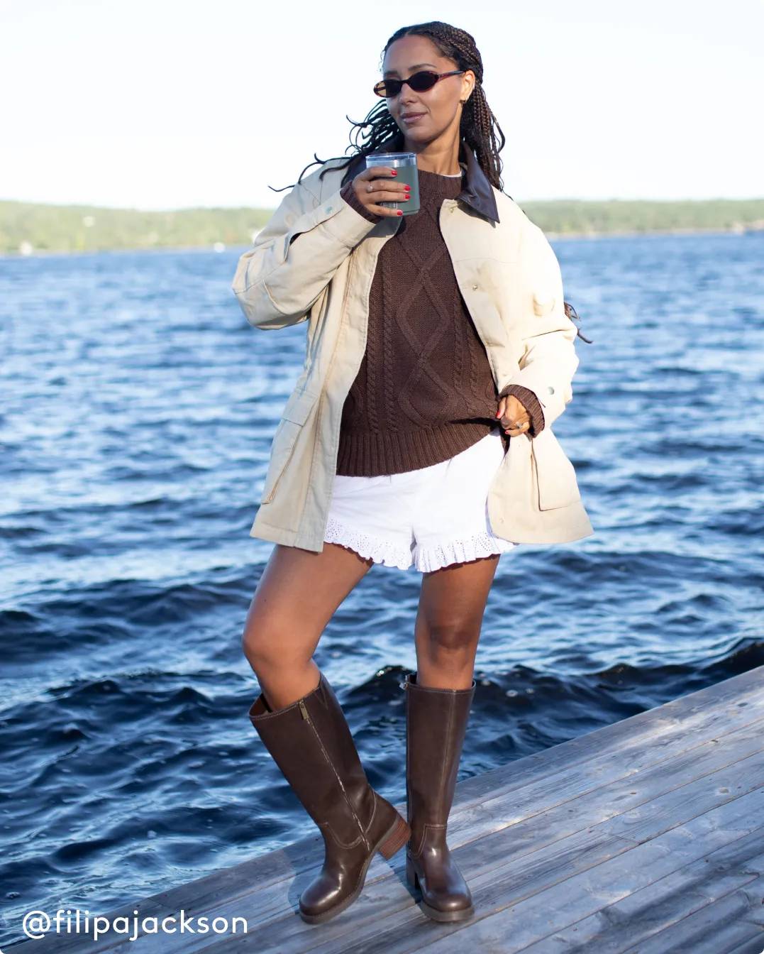 Influencer Filipa Jackson wearing brown knee-high boots