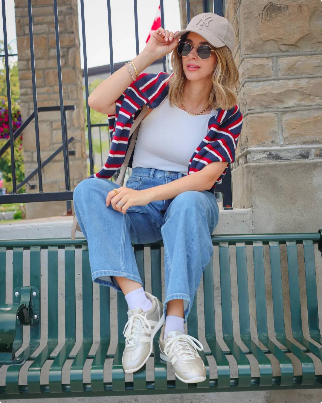 Influencer Sara Ballantyne sitting on a bench