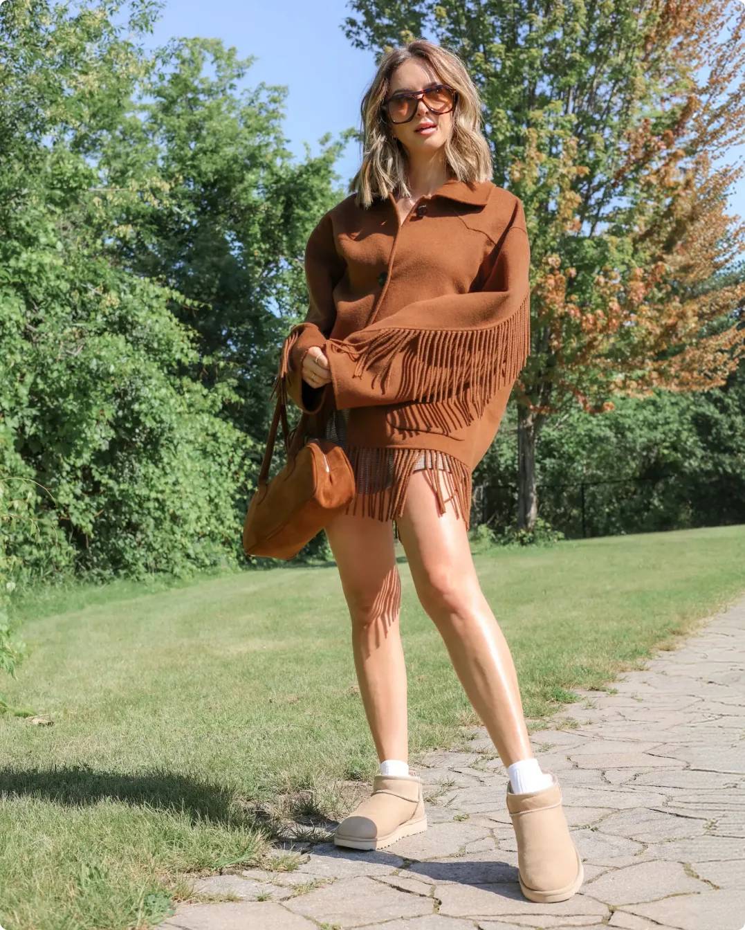 Influencer Sara Ballantyne in tan clothes wearing UGG shoes