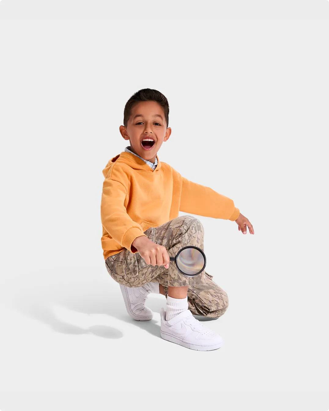 Toddler wearing white sneakers for back to school
