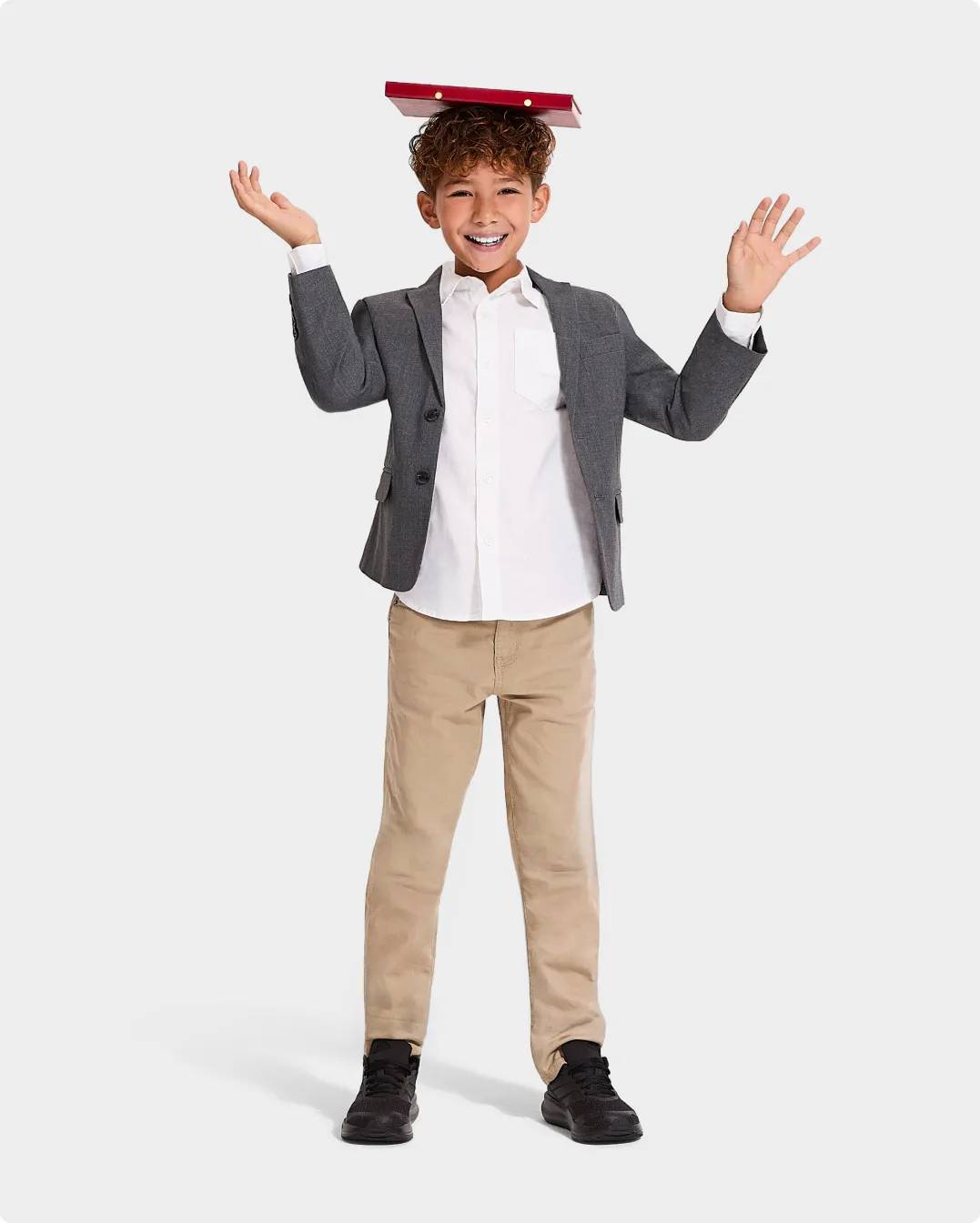 A youth boy wearing uniform shoes for back to school