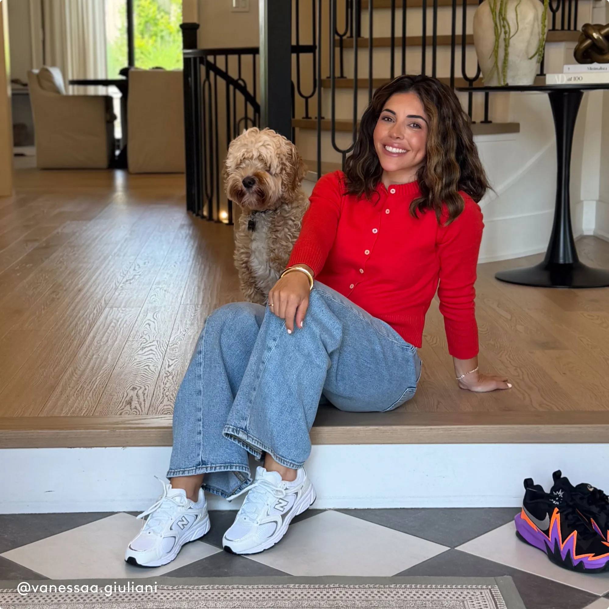 Woman and her dog sitting in her home