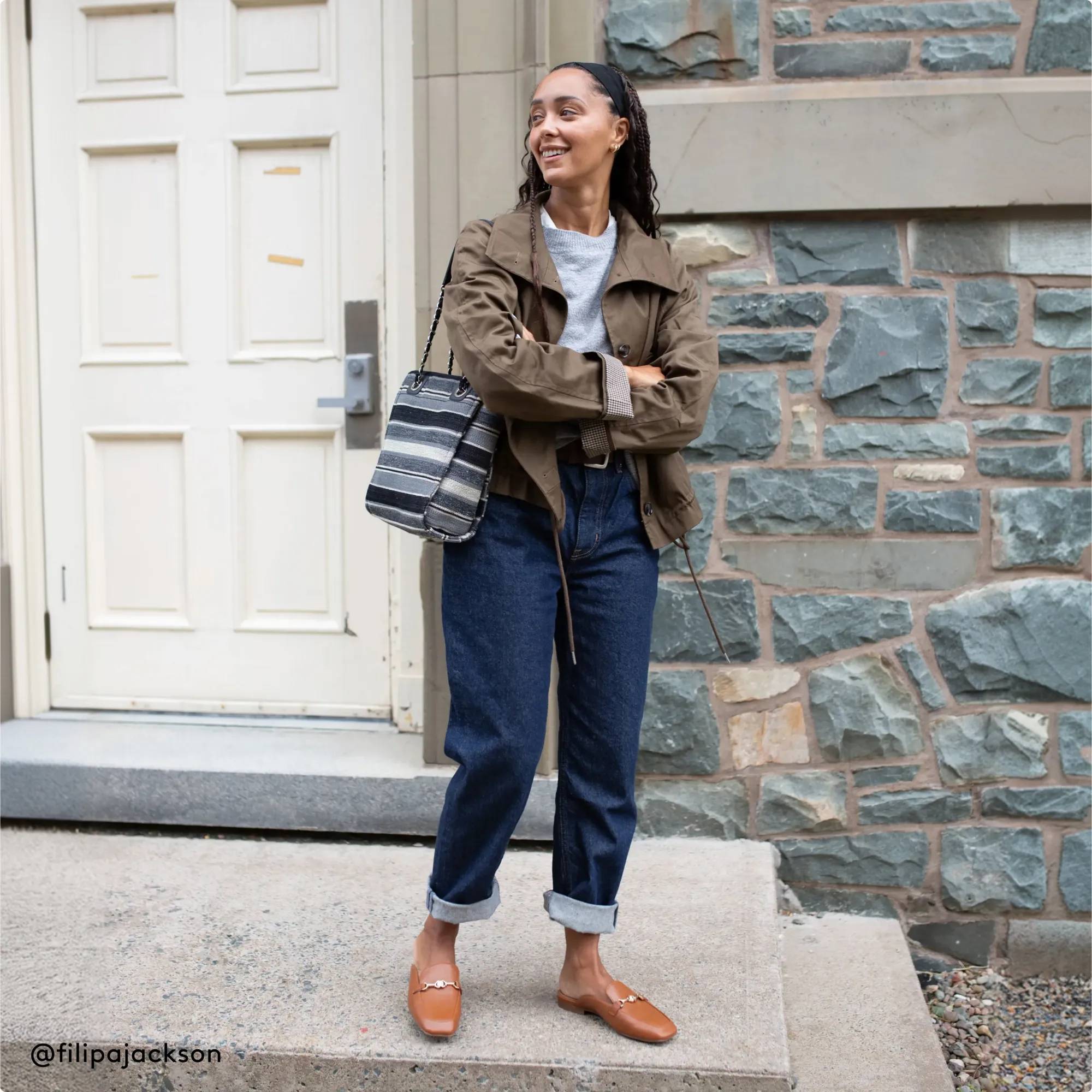 Woman wearing tan loafers