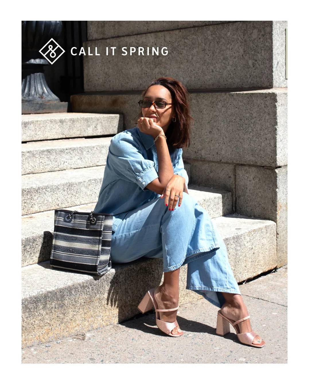 Woman in Call It Spring high heels sitting on steps