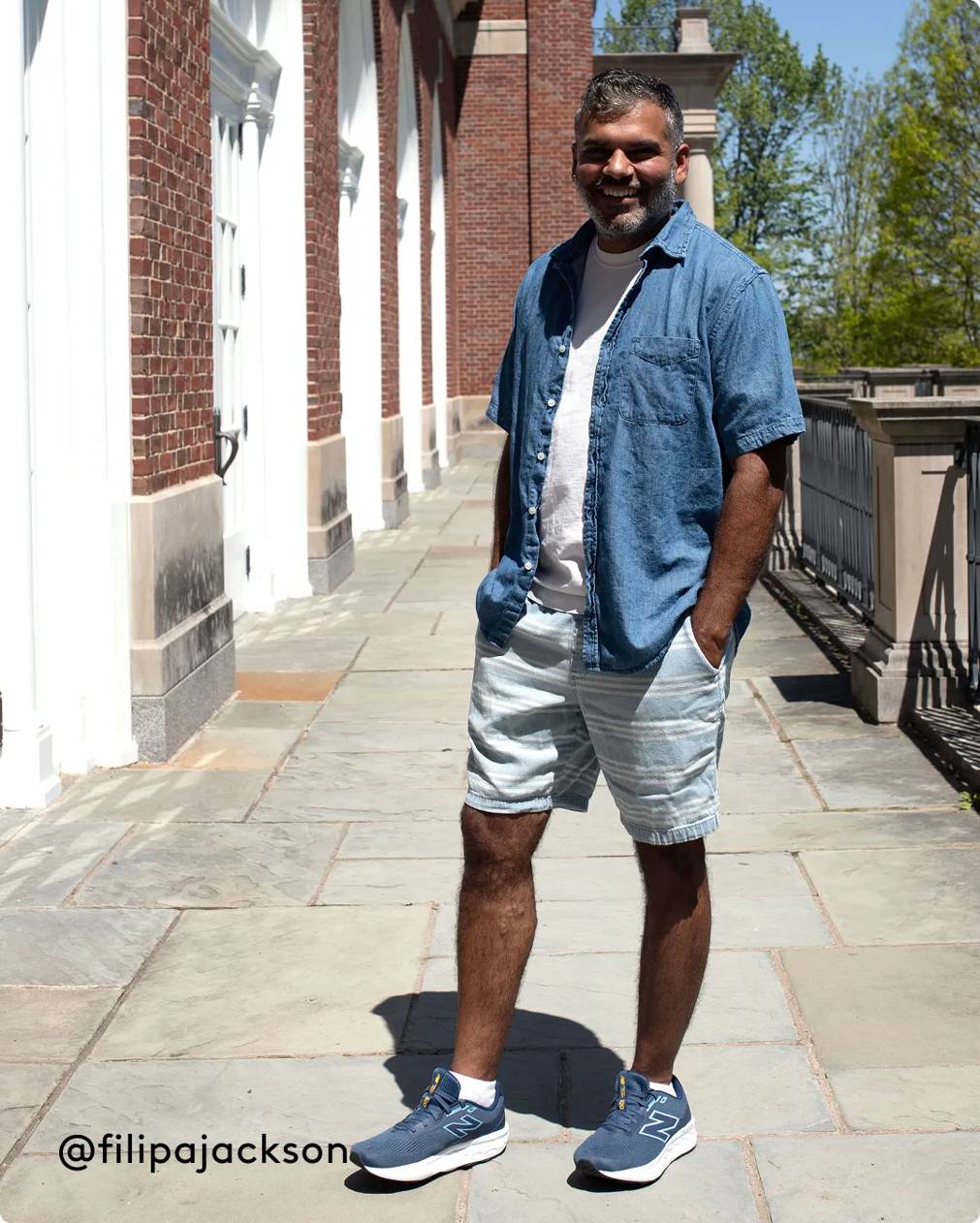 Man wearing blue wide width sneakers